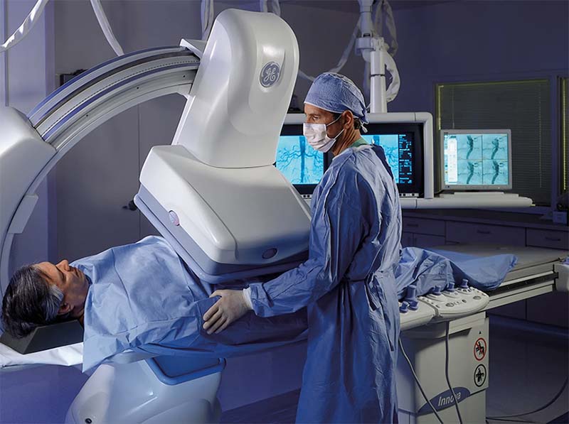 radiologists doing a procedure on a patient